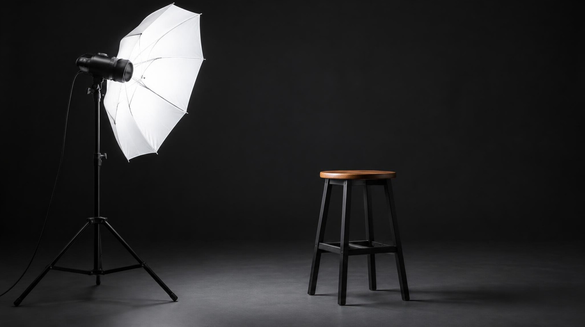 Studio light with umbrella reflector set up for a shoot